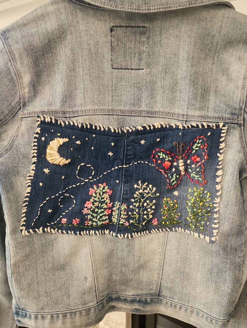 Levi's Light Wash Denim Jacket with Embroidered Butterfly Patch